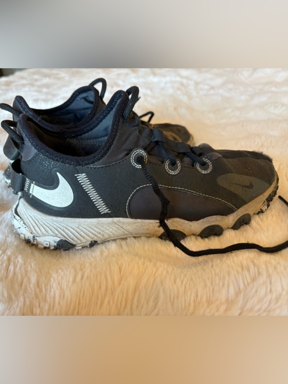 Nike Kids Black Turf shoes size 4 big kids.